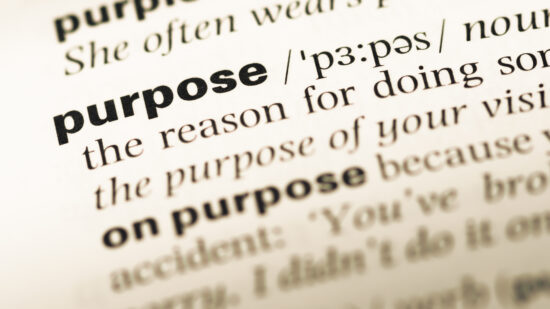 Close,Up,Of,Old,English,Dictionary,Page,With,Word,Purpose