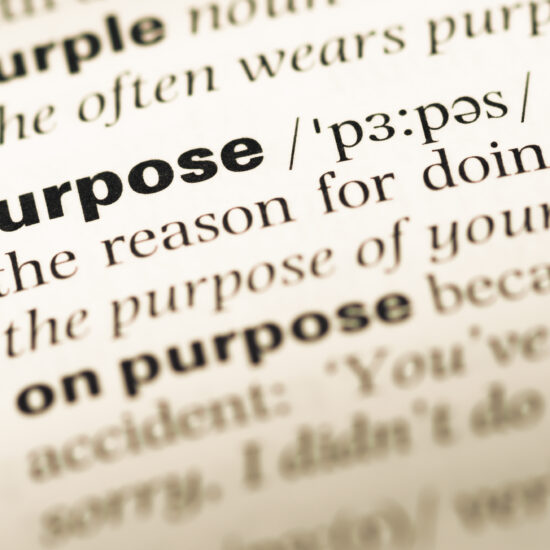 Close,Up,Of,Old,English,Dictionary,Page,With,Word,Purpose